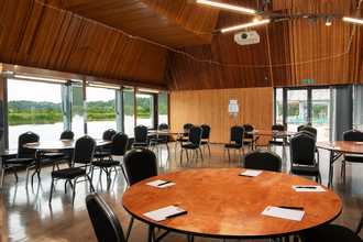 Chairs and tables in the conference room at Brockholes